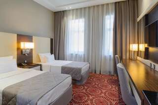 Отель Hotel Senator Караганда Двухместный номер Делюкс с 2 отдельными кроватями-1